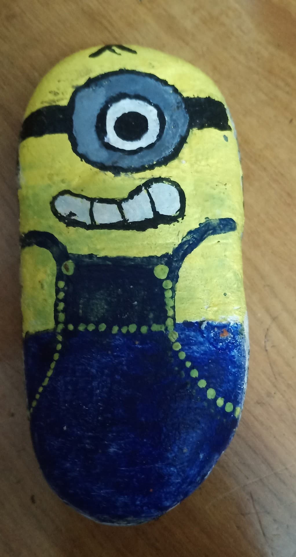 A cute minion stone painting
