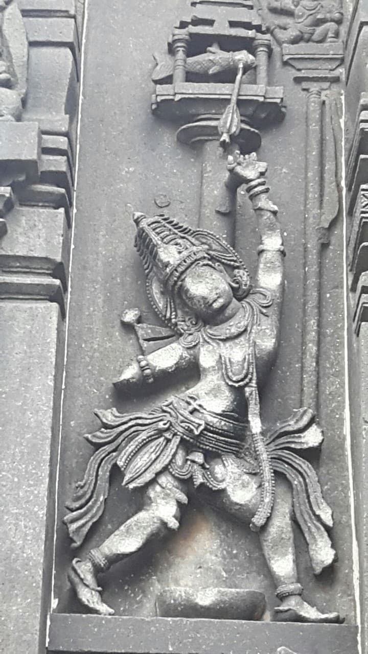 Arjuna aiming fish